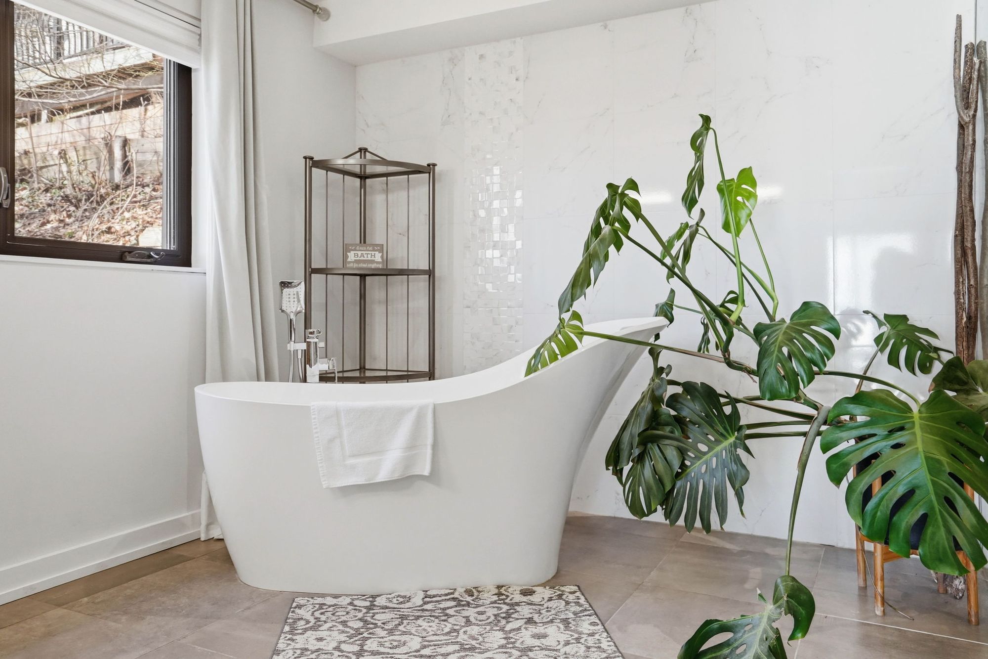 The freestanding soaker tub in the ensuite